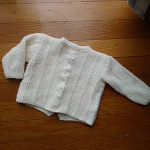 Handmade crochet baby sweater